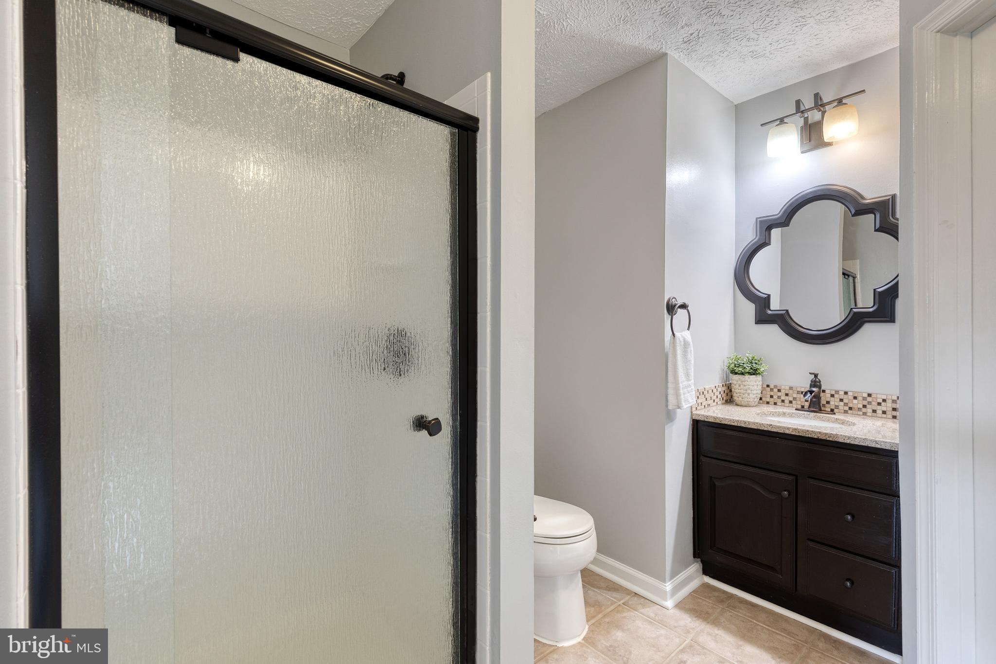 2445 Blue Spring Court, Unit 102 Odenton, MD 21113 - Photo 20 of 30 2nd bath connects to 2nd bedroom & living room