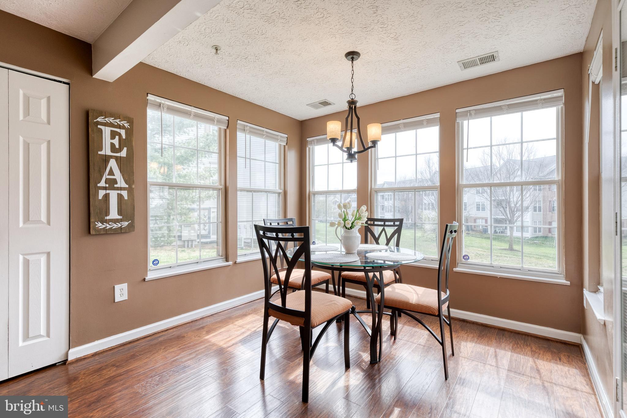 2445 Blue Spring Court, Unit 102 Odenton, MD 21113 - Photo 7 of 30 Sun-filled dining room!