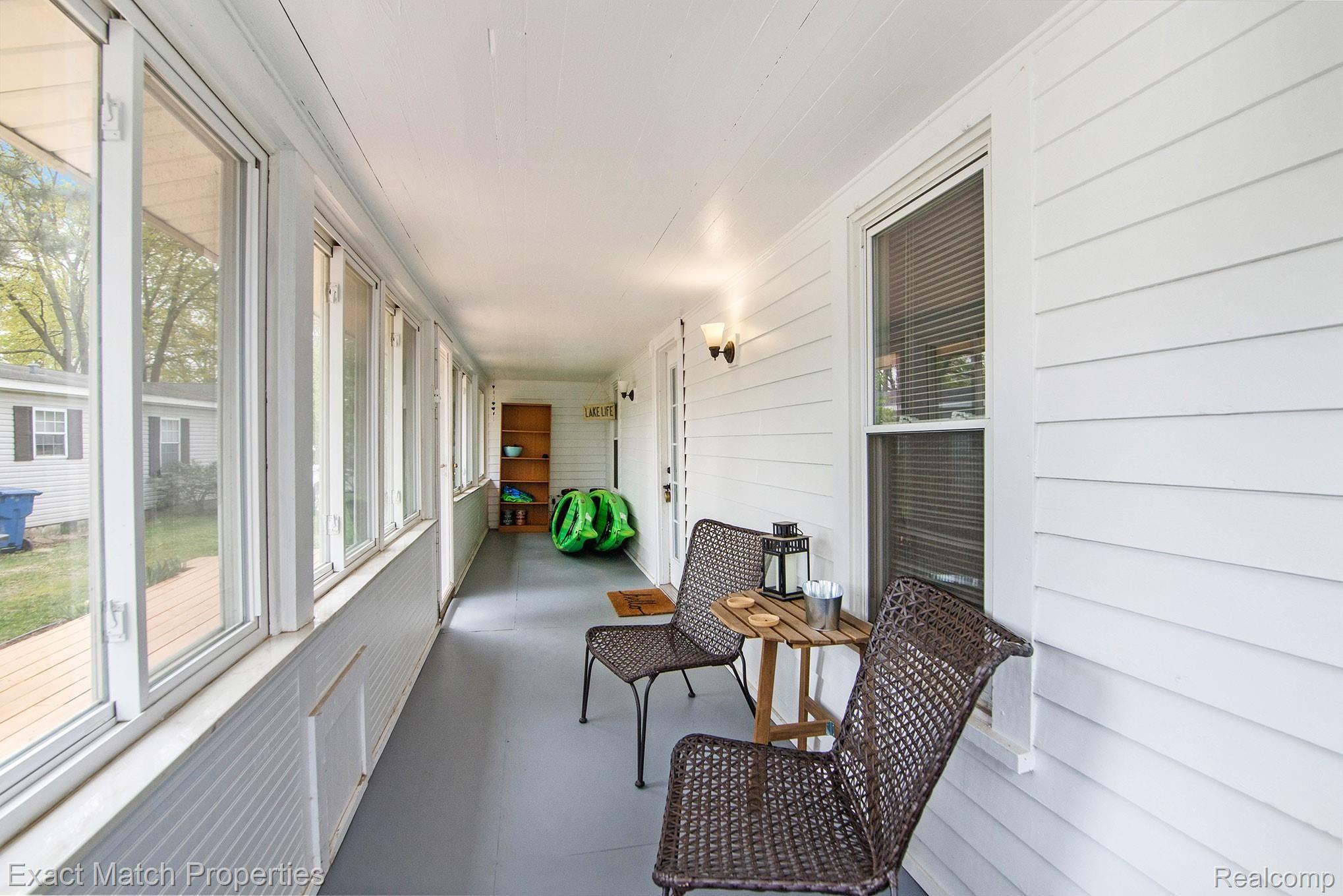 4115 Mapleleaf Road Waterford, MI 48328 - Photo 18 of 31 enclosed porch and a place to store your kayaks