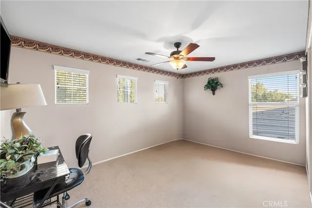 a workspace with furniture and window