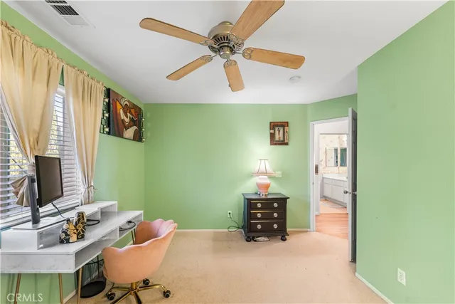 a room with furniture and a flat screen tv