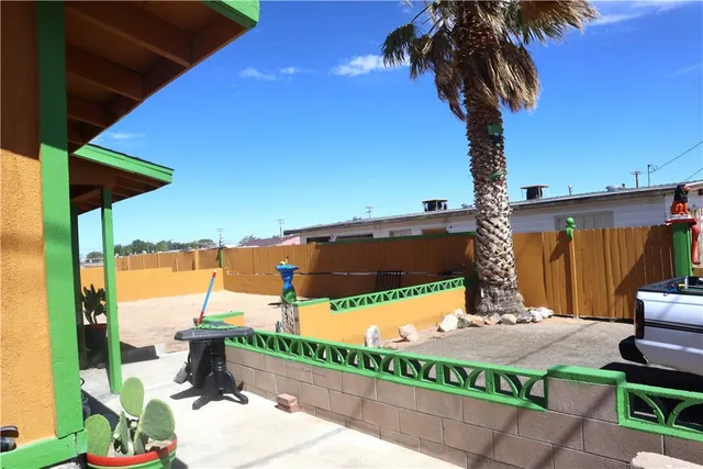 a view of a backyard with a patio