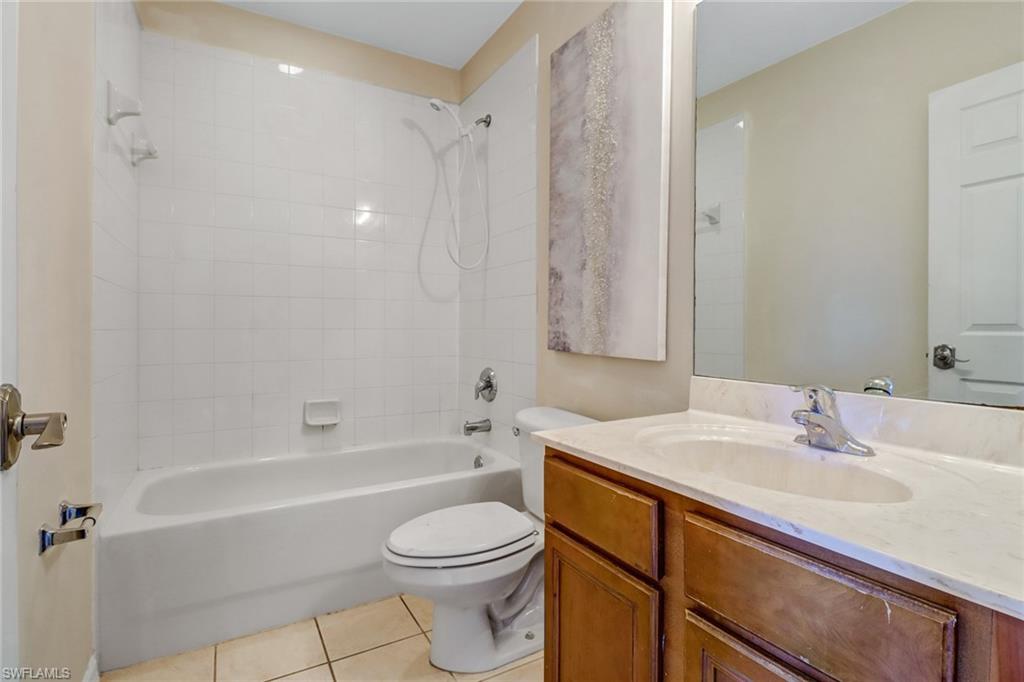 17536 Cherry Ridge Lane Fort Myers, FL 33967 - Photo 20 of 26 a bathroom with a sink a toilet and shower