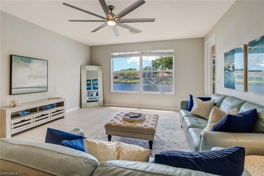 17536 Cherry Ridge Lane Fort Myers, FL 33967 - Photo 2 of 26 a living room with furniture and a large window