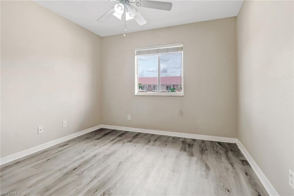 17536 Cherry Ridge Lane Fort Myers, FL 33967 - Photo 22 of 26 an empty room with a window