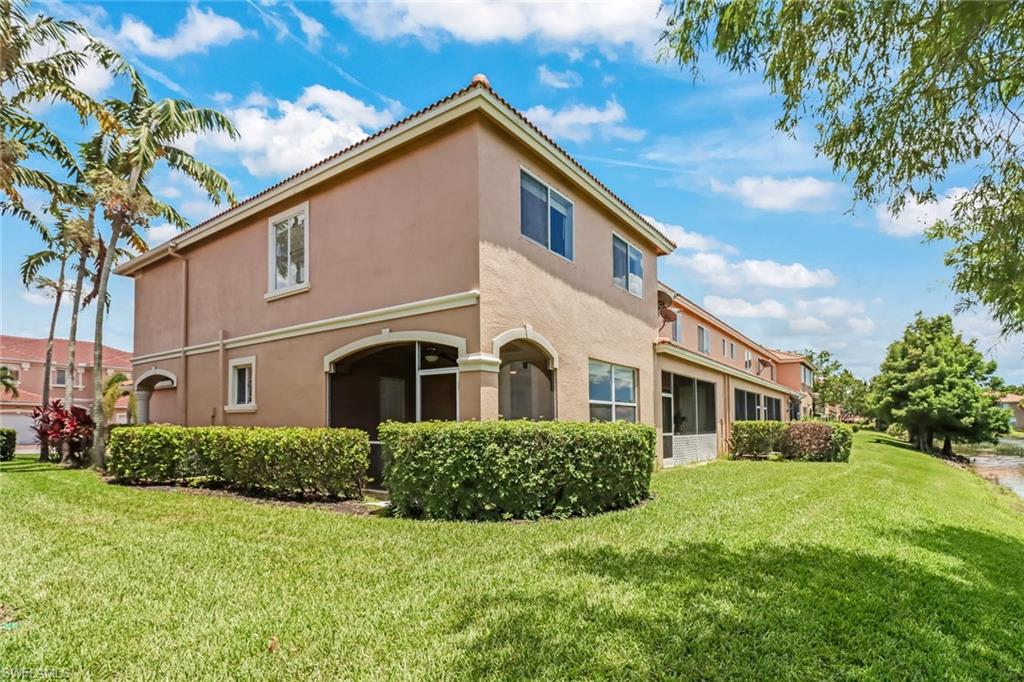 17536 Cherry Ridge Lane Fort Myers, FL 33967 - Photo 24 of 26 a front view of a house with a yard