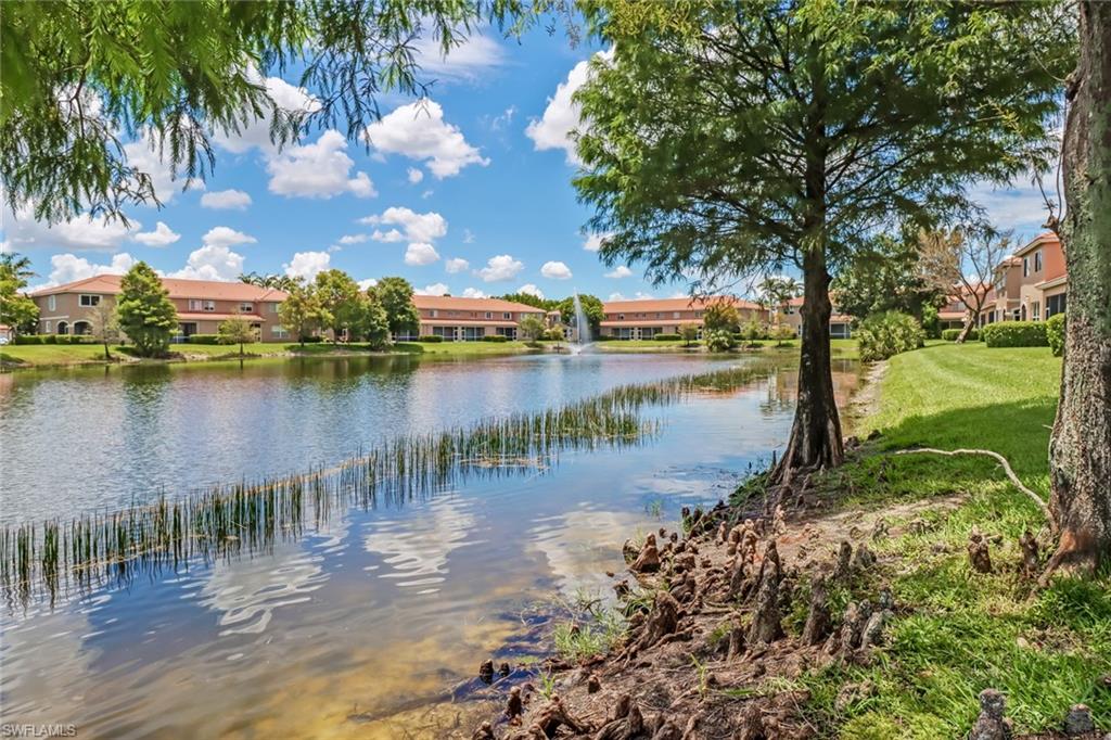 17536 Cherry Ridge Lane Fort Myers, FL 33967 - Photo 25 of 26 a view of a lake with houses