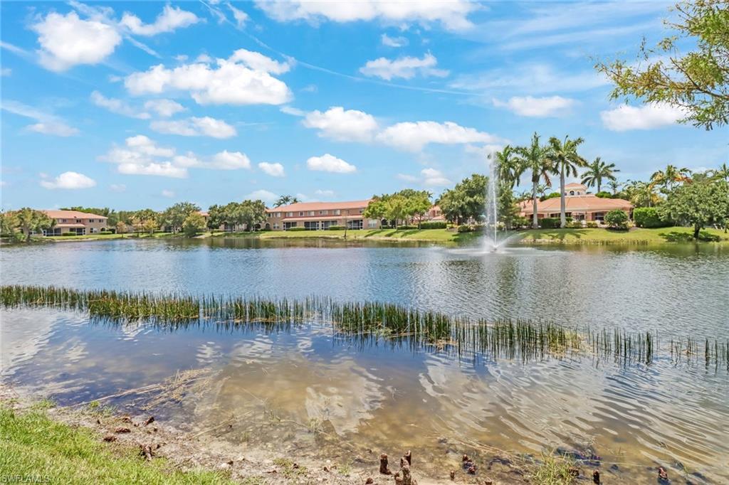 17536 Cherry Ridge Lane Fort Myers, FL 33967 - Photo 26 of 26 a view of a lake with houses in front of it