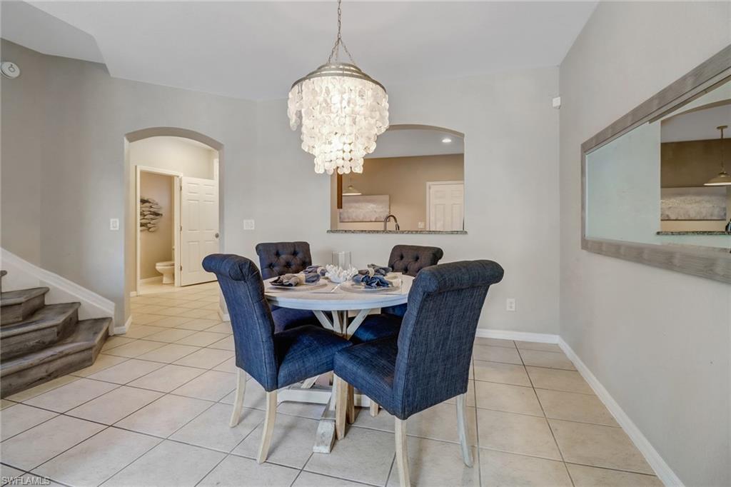 17536 Cherry Ridge Lane Fort Myers, FL 33967 - Photo 6 of 26 a view of a dining room with furniture
