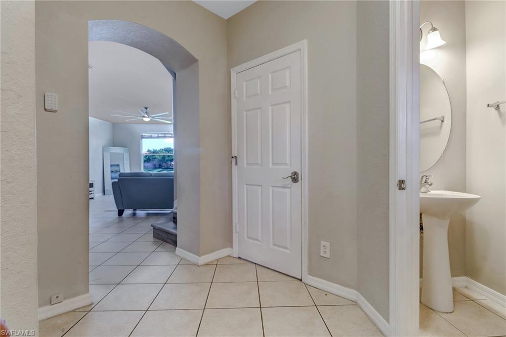17536 Cherry Ridge Lane Fort Myers, FL 33967 - Photo 7 of 26 a view of a hallway view with furniture and a bathroom