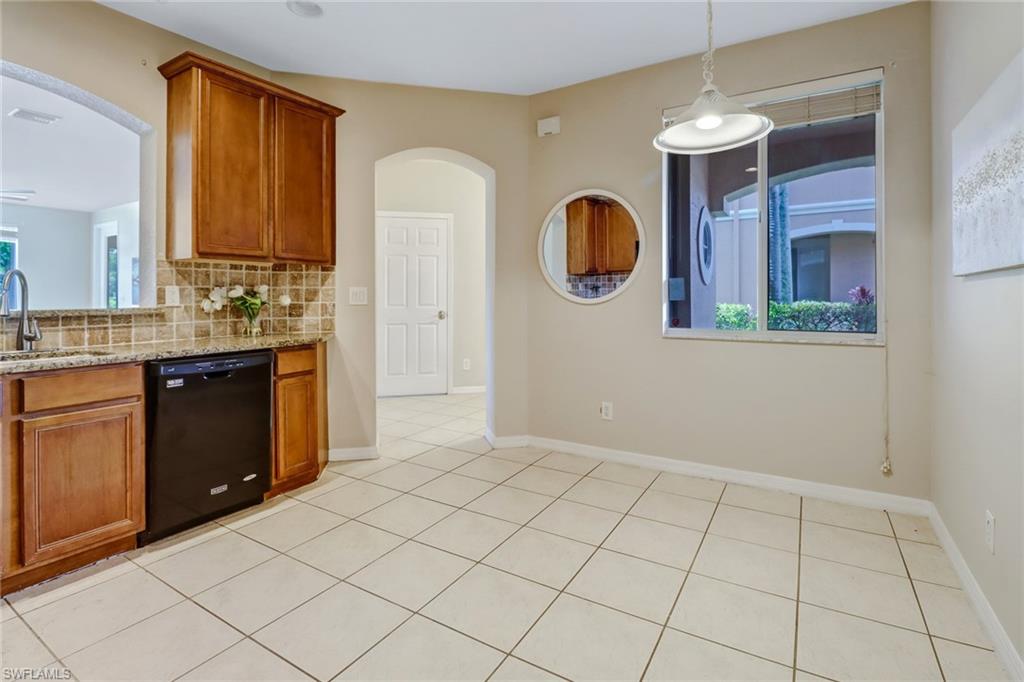 17536 Cherry Ridge Lane Fort Myers, FL 33967 - Photo 10 of 26 a kitchen with a sink and cabinets