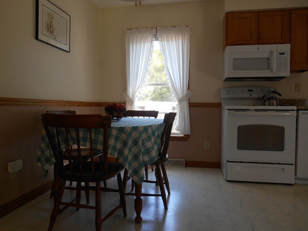 23 Reed Hill Road Wales, MA 01081 - Photo 8 of 21 a dining room with furniture and window