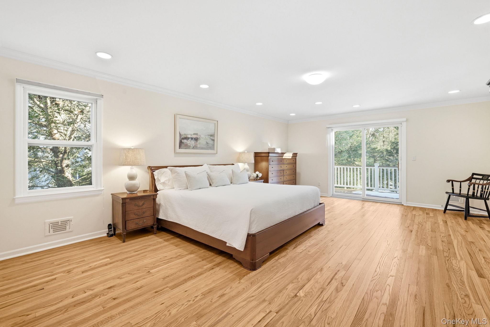 42 Butler Road Scarsdale, NY 10583 - Photo 17 of 35 Primary bedroom has its own tranquil deck