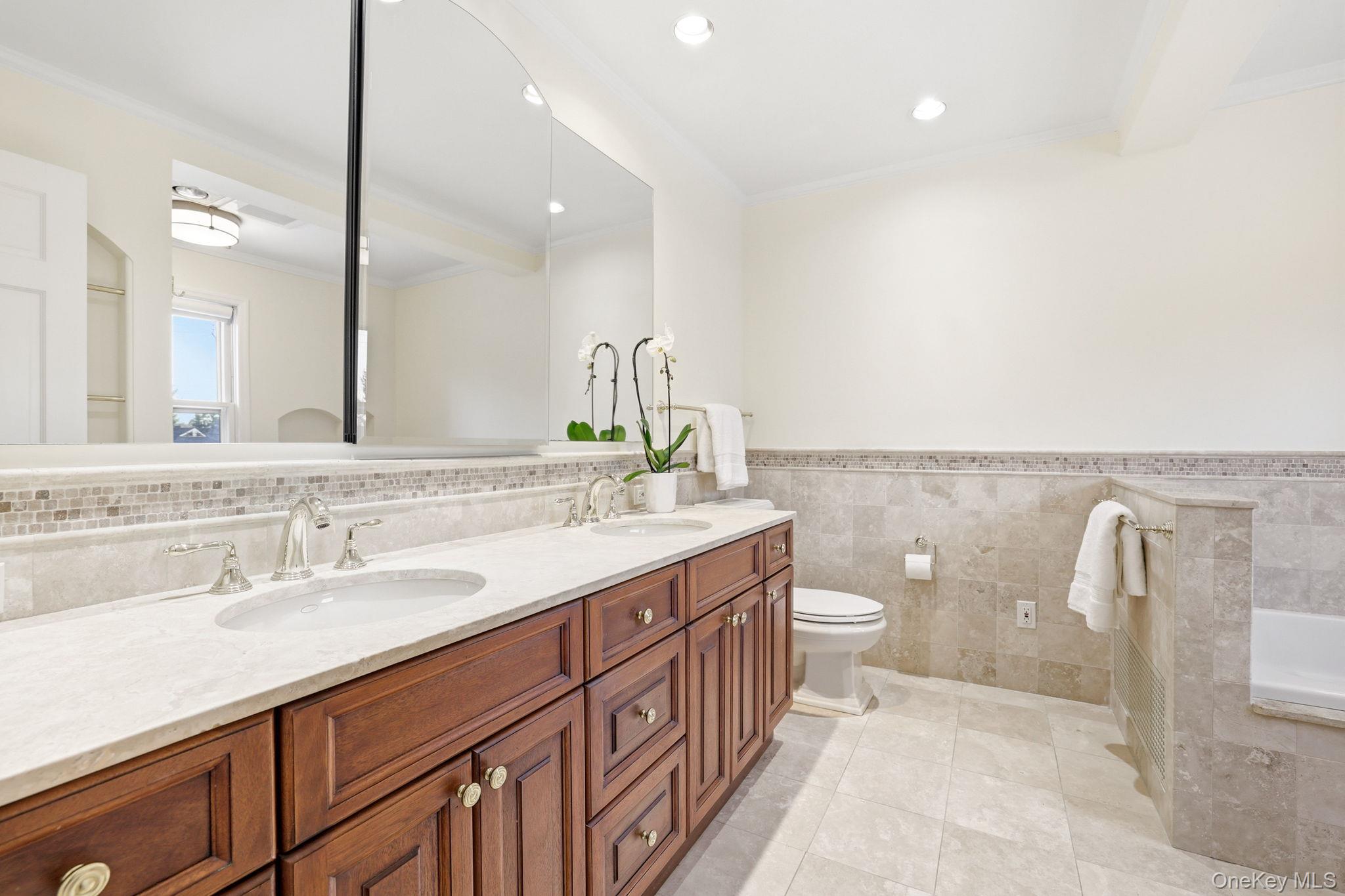 42 Butler Road Scarsdale, NY 10583 - Photo 22 of 35 Primary bathroom with double vanity
