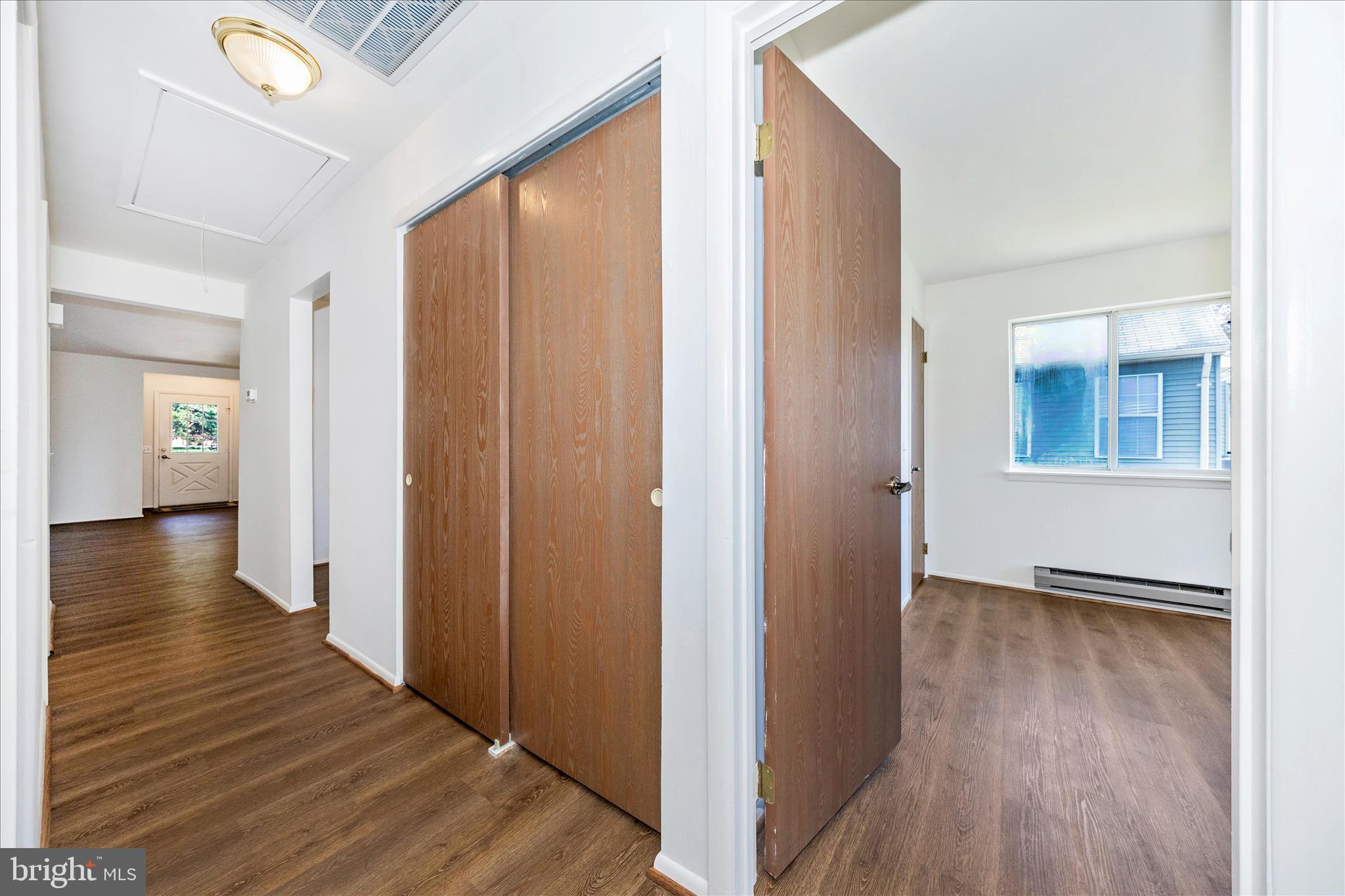 5738 Box Elder Court Frederick, MD 21703 - Photo 26 of 50 a view of hallway with wooden floor