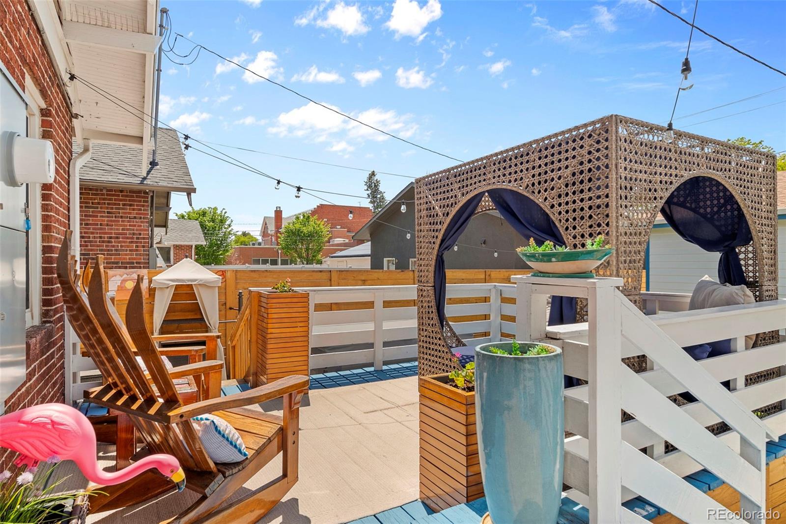4319 Raritan Street Denver, CO 80211 - Photo 21 of 27 a view of a balcony with chairs