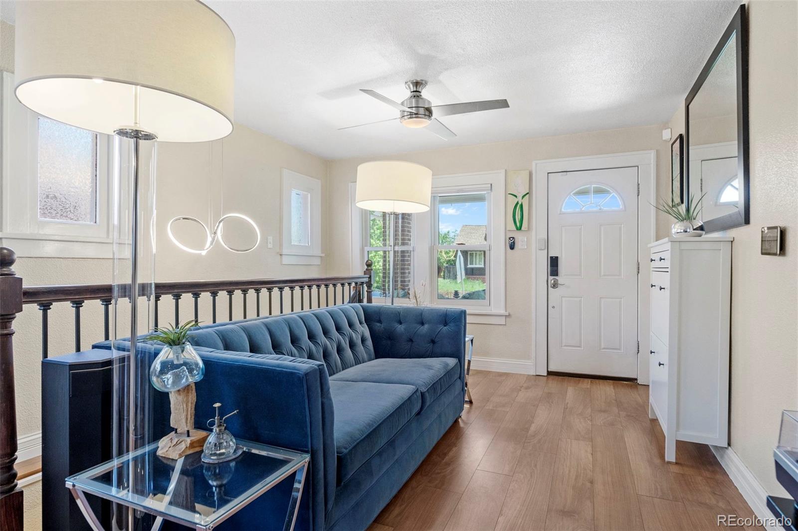 4319 Raritan Street Denver, CO 80211 - Photo 5 of 27 a living room with furniture and a window