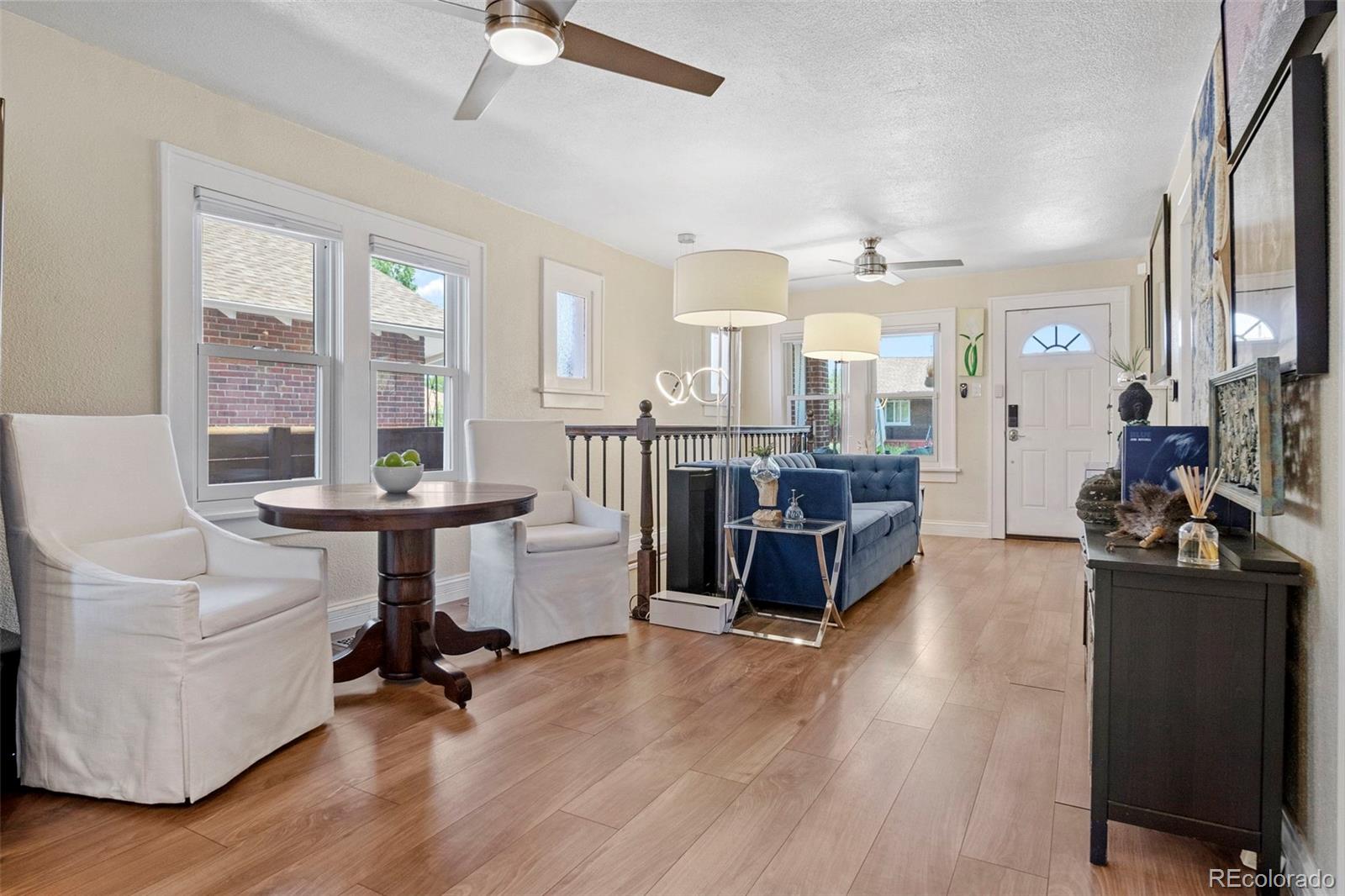 4319 Raritan Street Denver, CO 80211 - Photo 6 of 27 a view of a living room and dining room