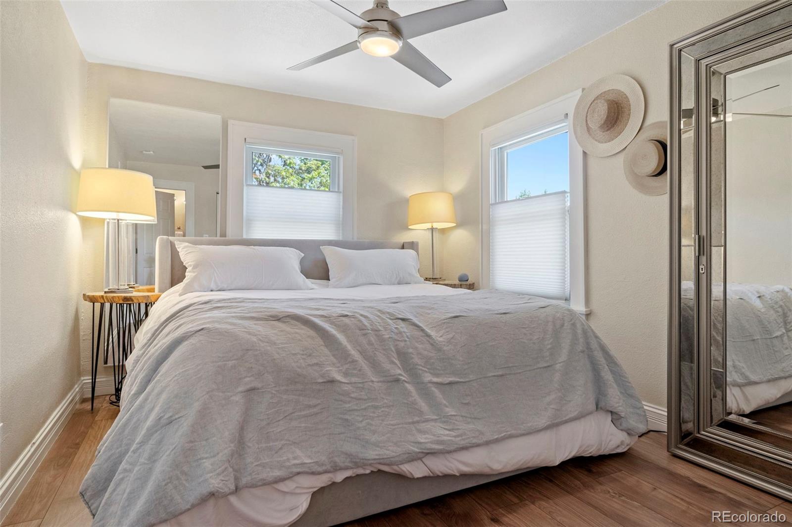 4319 Raritan Street Denver, CO 80211 - Photo 7 of 27 a bedroom with a bed and a window