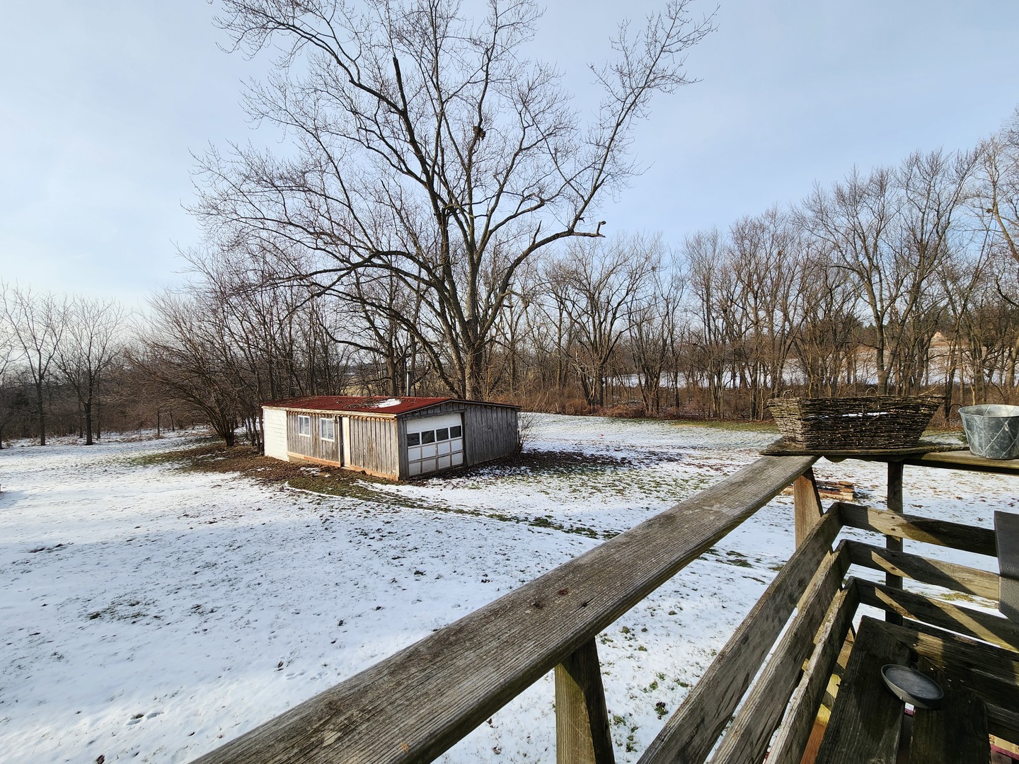 47 Route Maple Park Maple Park, IL 60151 - Photo 29 of 36 a view of a backyard and snow