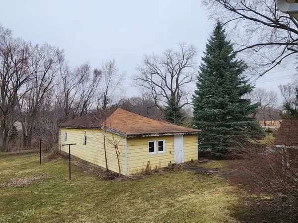 a lobby with furniture and stairs