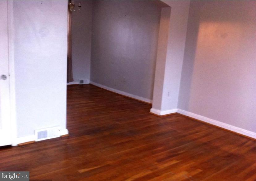 1310 Cedarcroft Road Baltimore, MD 21239 - Photo 6 of 22 Picture of Living Room & Dining Room Floors