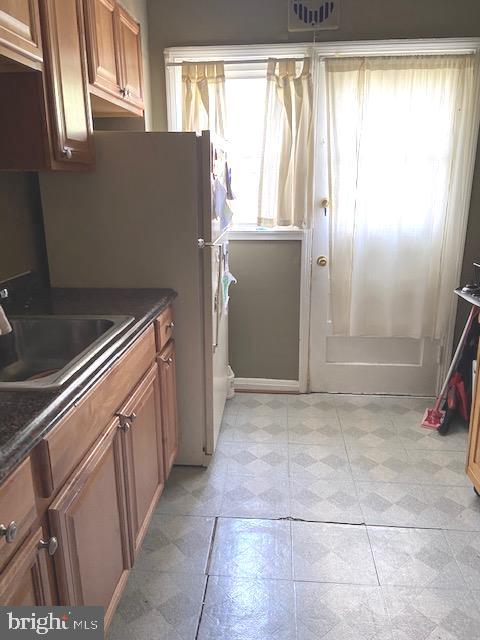1310 Cedarcroft Road Baltimore, MD 21239 - Photo 8 of 22 Door from kitchen to rear yard.