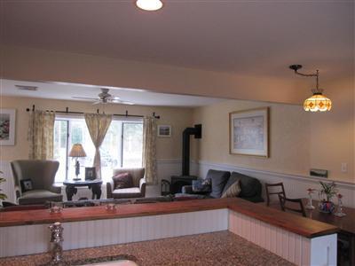 2 South Sandwich Road Sandwich, MA 02563 - Photo 4 of 17 a living room with furniture and a large window