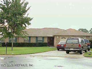 12346 Raleigh Ridge Drive Jacksonville, FL 32225 - Photo 1 of 1 a car parked in front of a house
