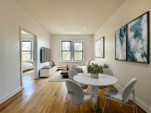 a living room with furniture and window