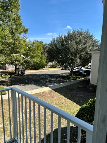 a view of street from a balcony