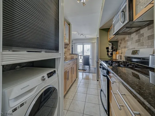 a kitchen with a stove and a kitchen