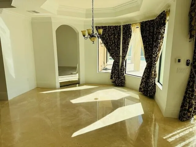 a bedroom with a bed and a fireplace