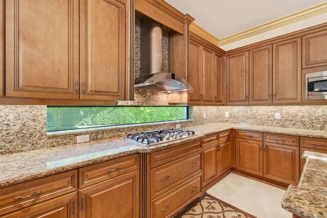 a bedroom with a bed and a table in it