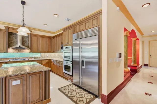 a bathroom with a sink a toilet and shower curtain