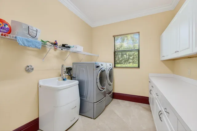 a view of a swimming pool with a yard and outdoor seating