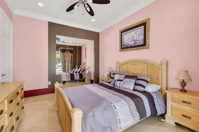 an aerial view of a house with a yard and plants