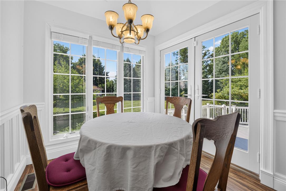 6467 Abbey Road Wind Gap, PA 18091 - Photo 18 of 46 A charming breakfast nook with abundant natural light and seamless access to outdoor living.