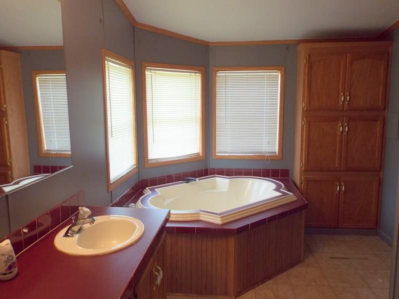 92 Traister Road Rimersburg, PA 16248 - Photo 12 of 22 Master bathroom offers his/hers sinks, a beautiful garden tub and to the right is a step in shower (not pictured)