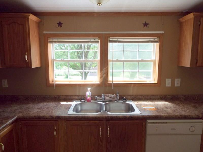 92 Traister Road Rimersburg, PA 16248 - Photo 6 of 22 Kitchen window looks over the back yard abutting the wooded tree line