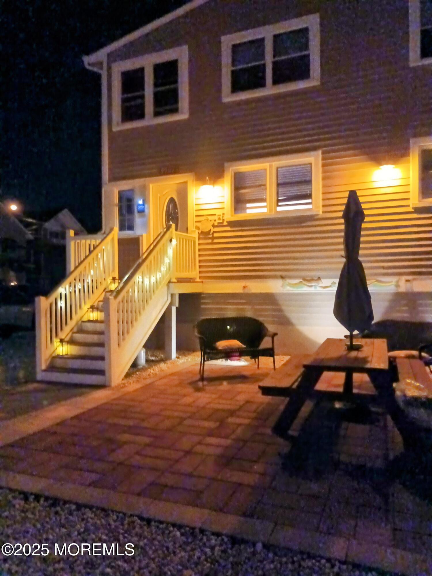 2020 Baltimore Avenue, Unit DOWN Seaside Heights, NJ 08751 - Photo 8 of 18 a view of a house with backyard and sitting area