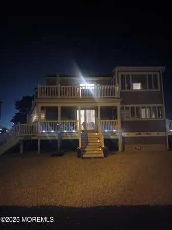 a front view of a house with swimming pool