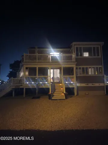 a front view of a house with swimming pool