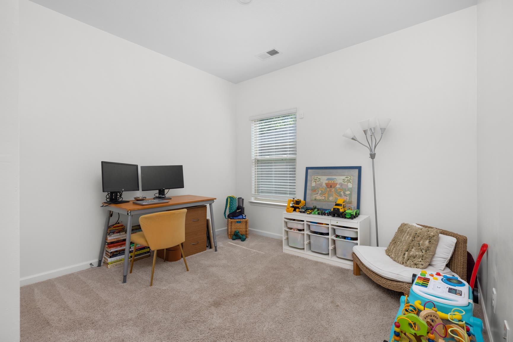 5132 Shellback Drive Millington, TN 38053 - Photo 20 of 24 a living room with furniture and a flat screen tv