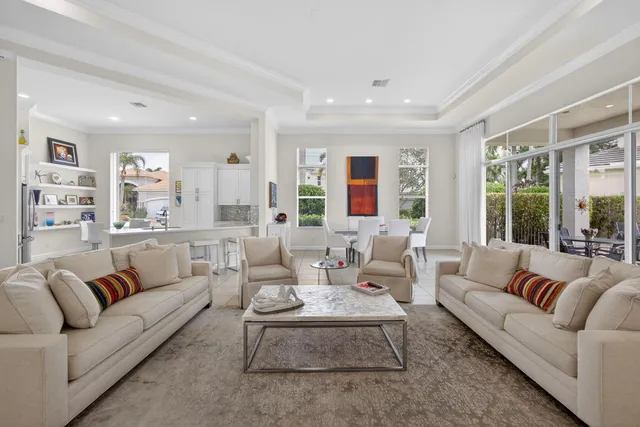 a bedroom with a bed and a chair