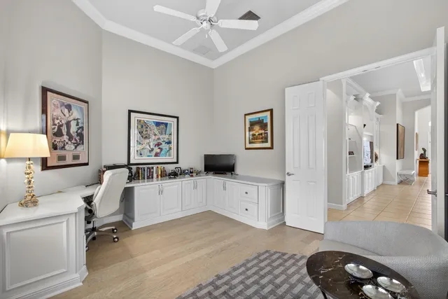 a bathroom with a sink vanity mirror and toilet