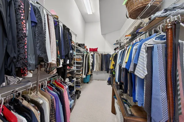 a view of a chair and tables in the patio