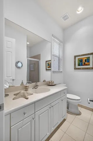 an aerial view of lake residential house with swimming pool and green space