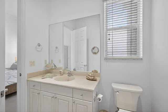 an aerial view of a house with a yard and potted plants