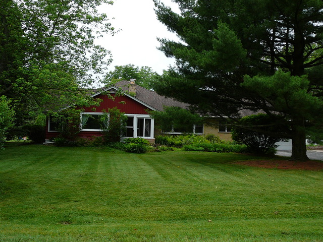 1835 Beechnut Road Northbrook, IL 60062 - Photo 1 of 1 a front view of a house with garden